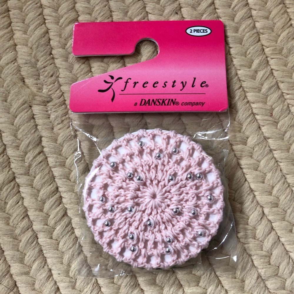 Little girl hair bun covers.  Pink and black.